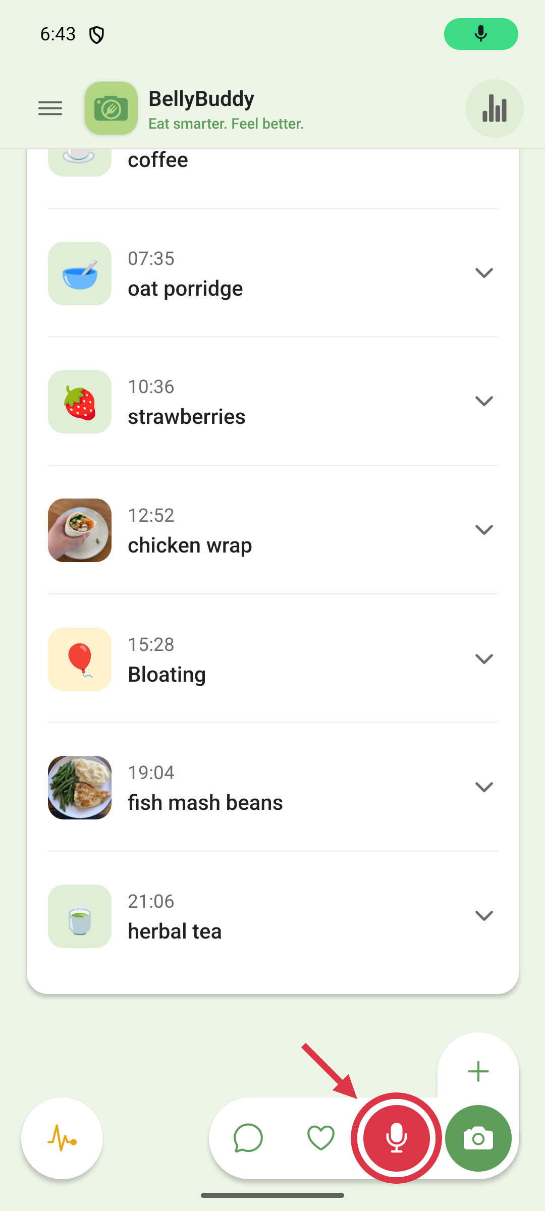 Holding the mic button in the input bar to speak a meal, with the timeline behind it